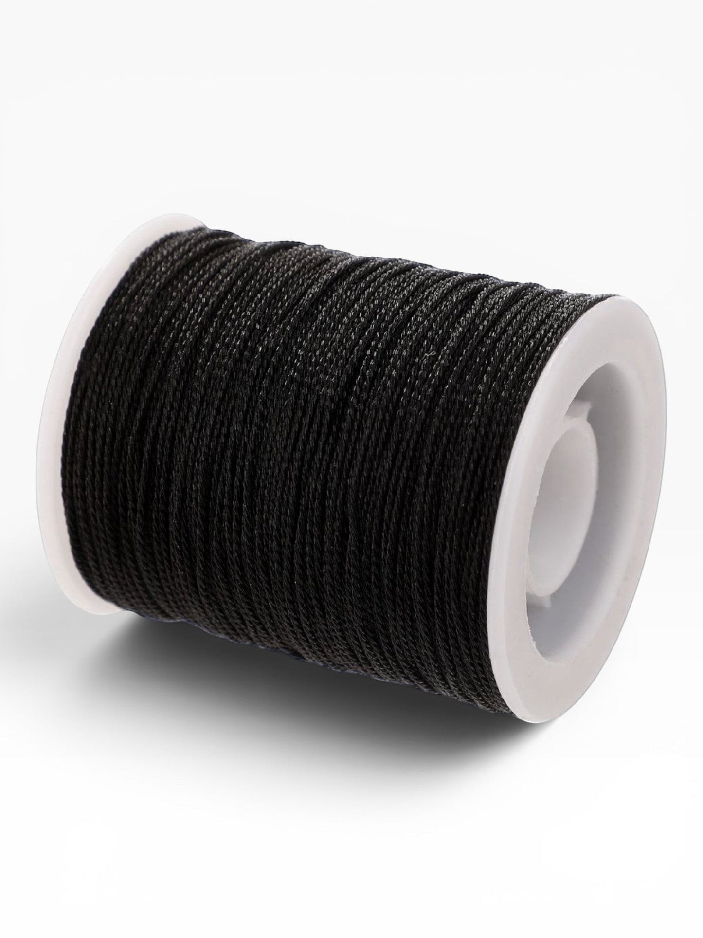 Rocchetto di filato gioiello nero Scintilla Fine 0,7mm di Merceria & Tendenze per bijoux e micro-macramè