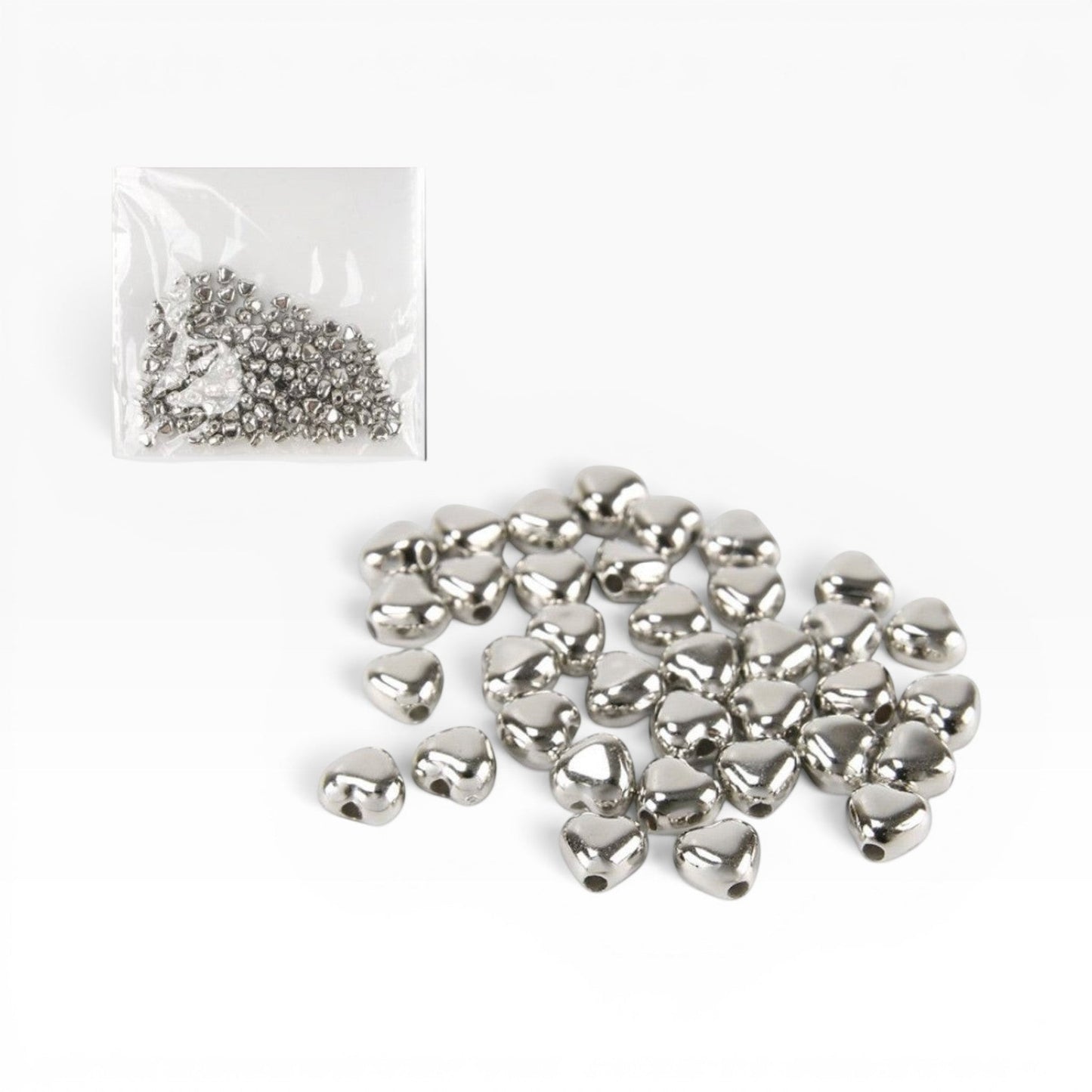 Perline a forma di cuore color argento con finitura metallizzata lucida di Merceria & Tendenze per bigiotteria fai-da-te