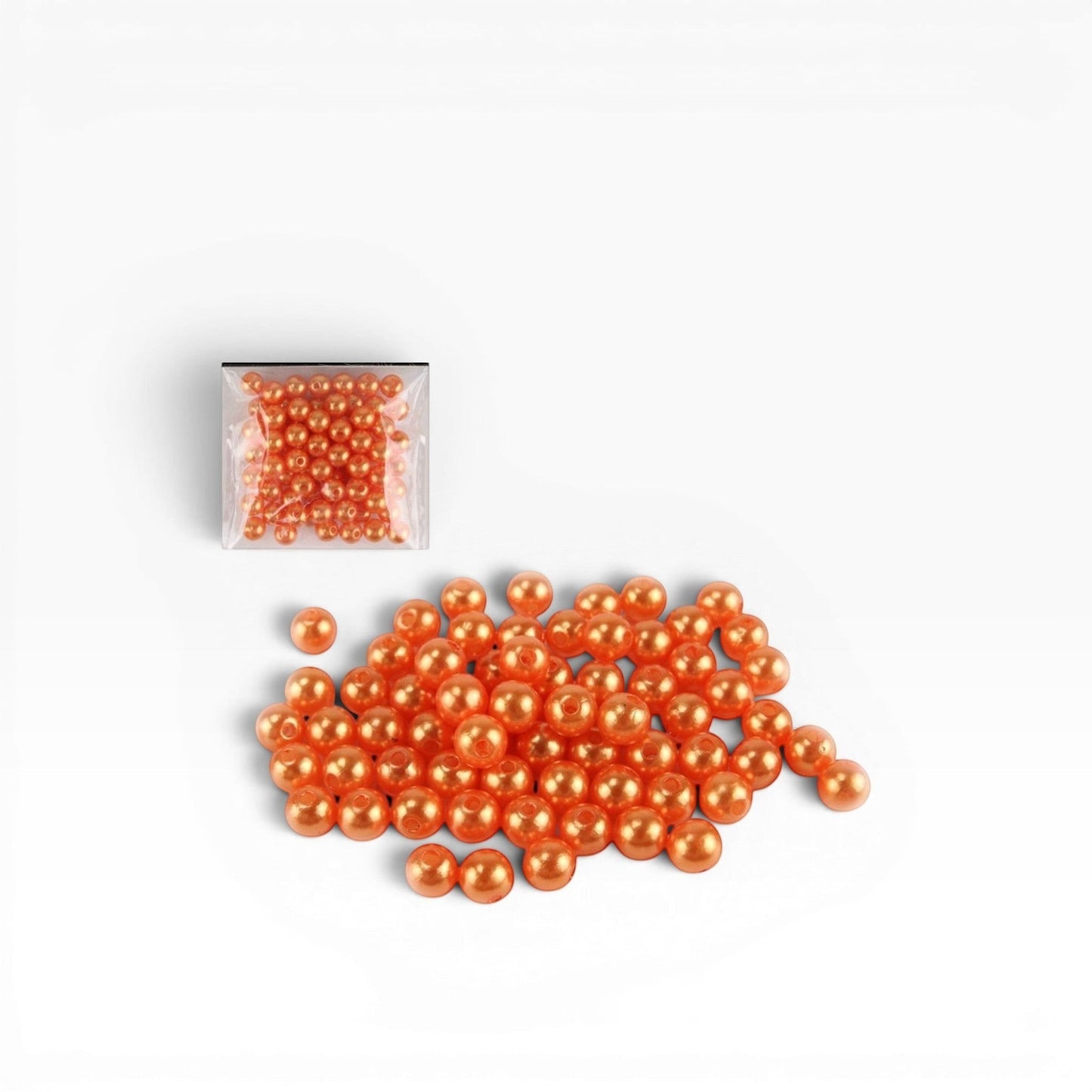 Perline sintetiche arancioni da 8 mm di Merceria & Tendenze, ideali per creare bracciali e collane handmade.