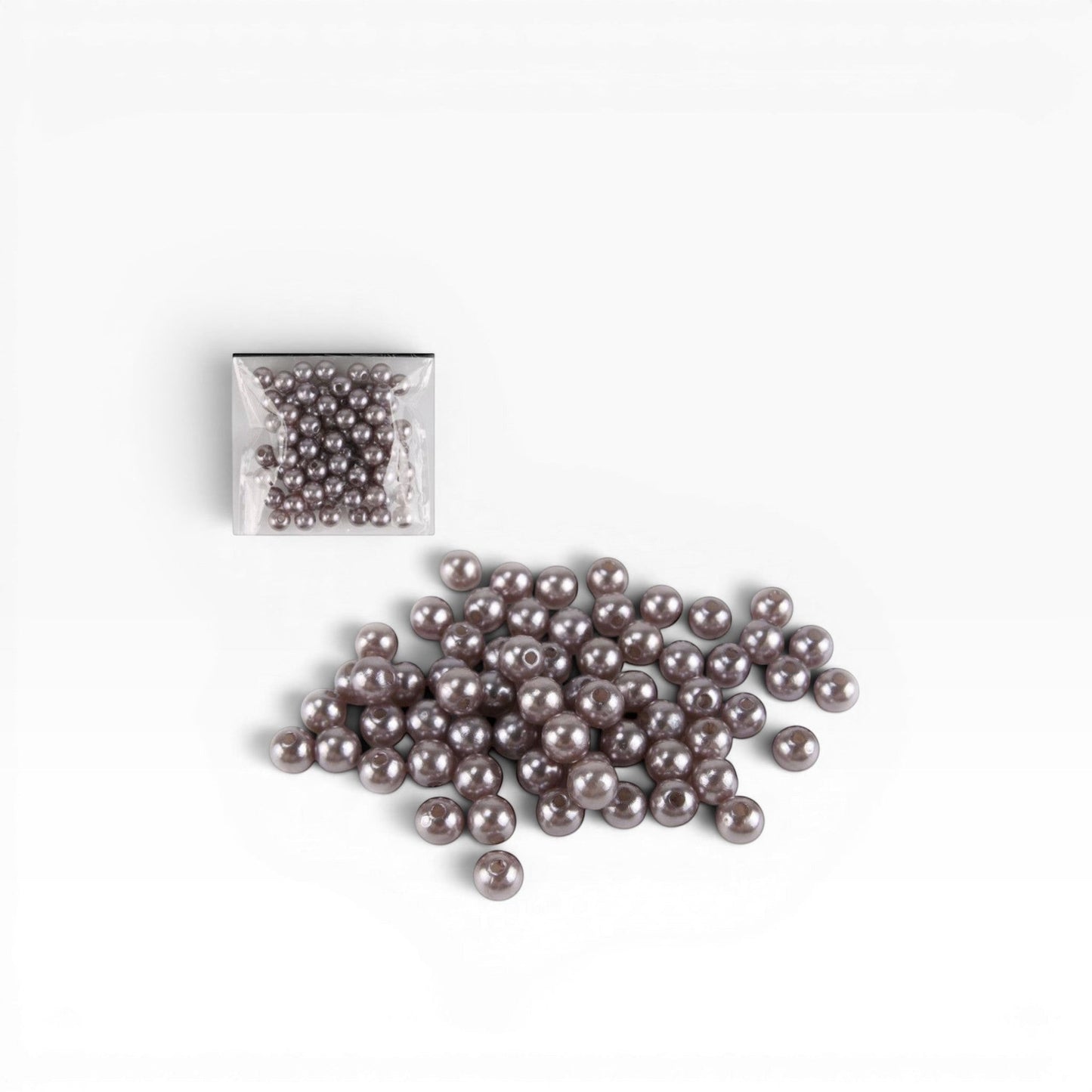 Perline sintetiche rotonde 8 mm color tortora perlato di Merceria & Tendenze per creare bracciali e collane handmade.